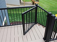 <b>Add Security with a Gate! Gates offer an extra level of safety and accessibility for any deck design. Create a contained, safe place for your young children or your pets by adding a gate to your new outdoor room.</b>