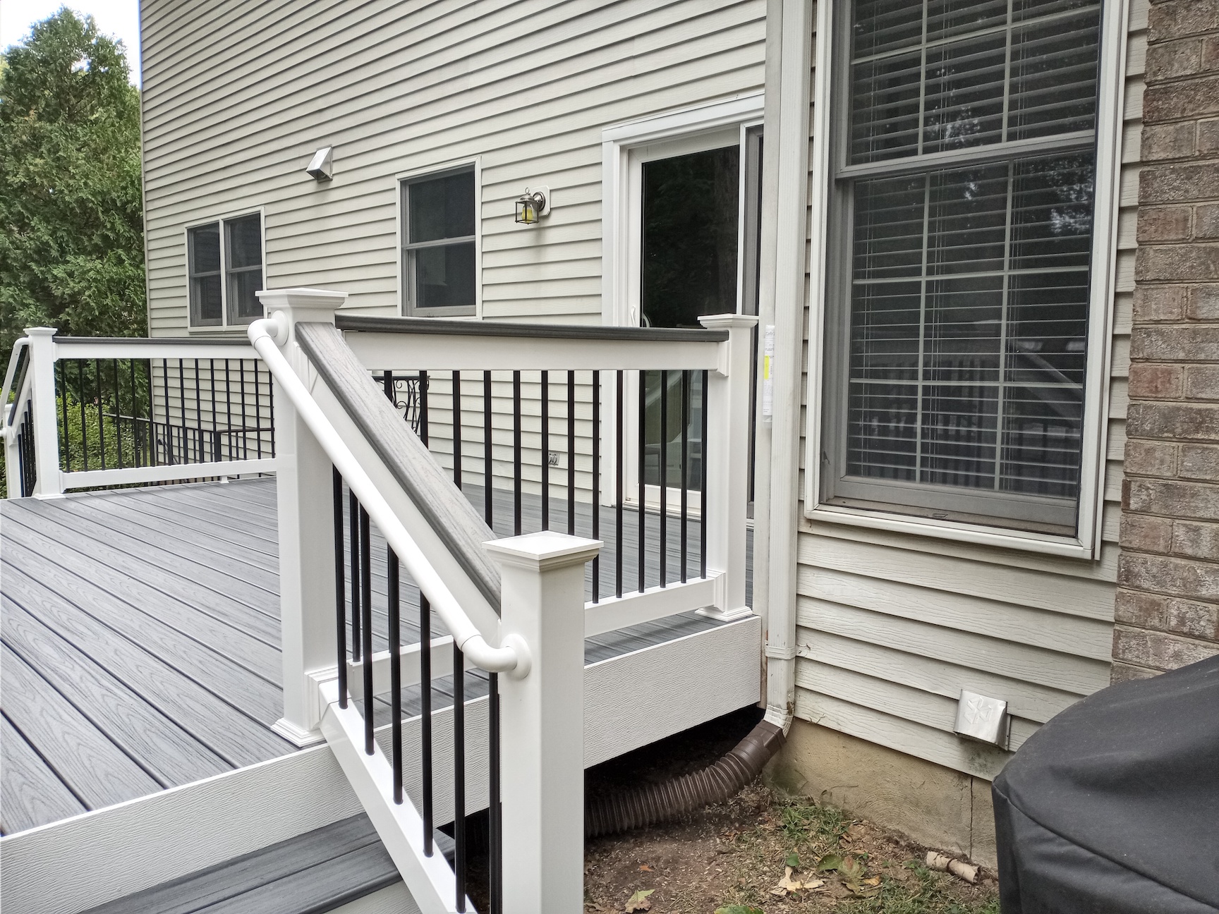 Makeover Monday Grey Composite Deck in Millersville, MD Fence & Deck