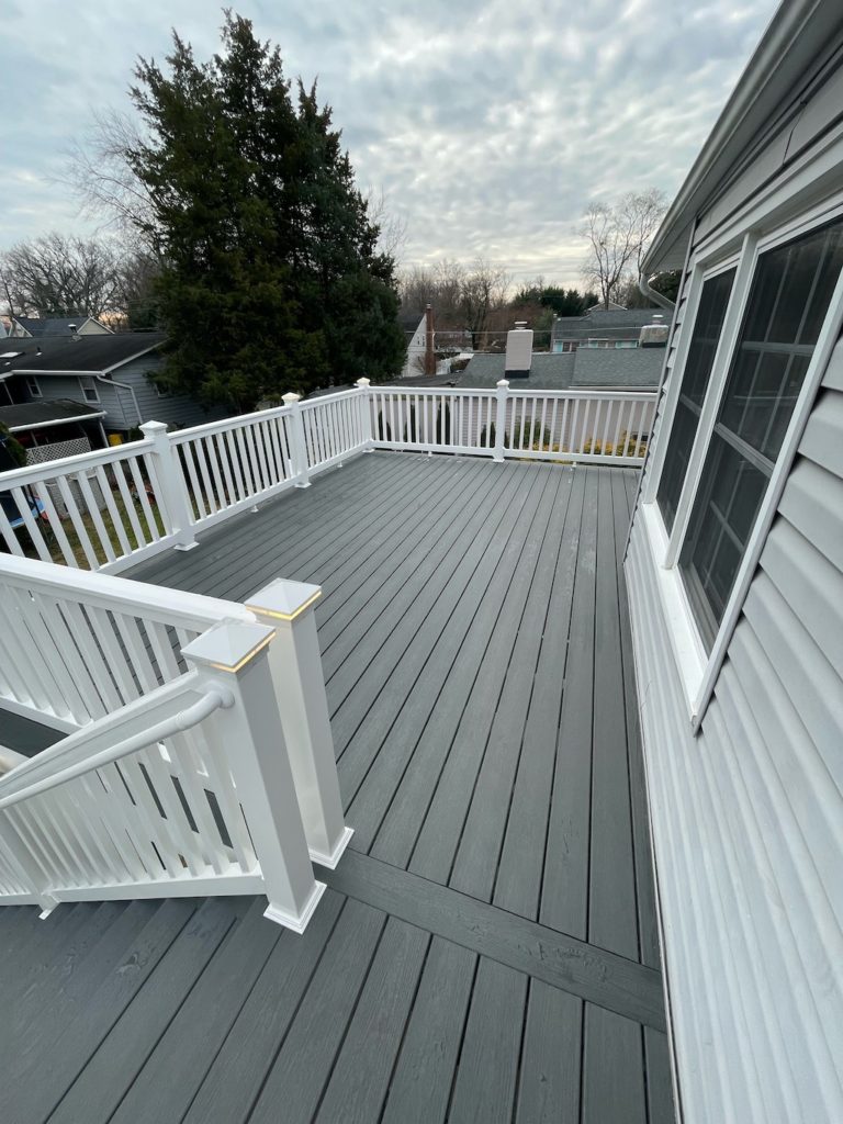 Trex decking in Clam Shell hue with railing lights