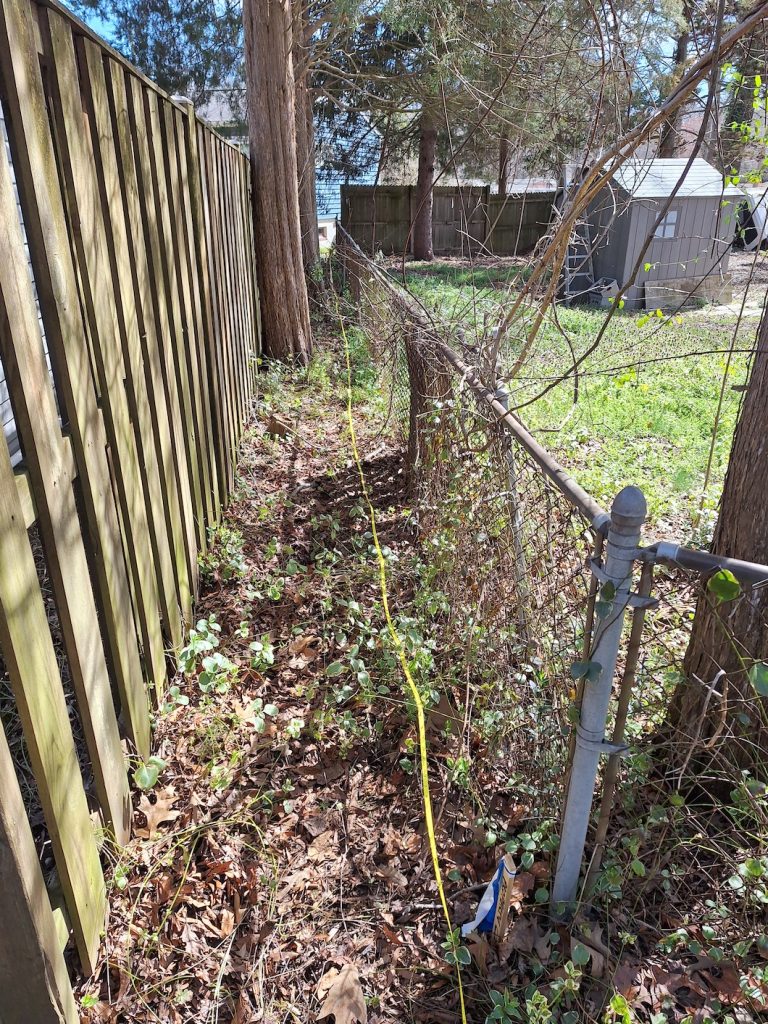 wood fence before makeover in Davidsonville