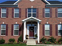 <b>Portico addition to the front of a brick home</b>