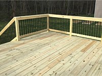 <b>Wood deck with wood railing and black aluminum balusters 2</b>