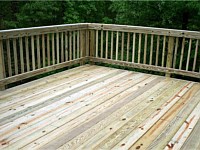 <b>Pressure treated wood deck with wood railing</b>