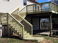 <b>Wood deck and stairs with wood railing</b>
