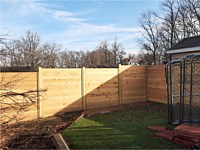<b>6 foot Horizontal cedar stepped fencing with no spacing between the pickets with standard black post caps.</b>