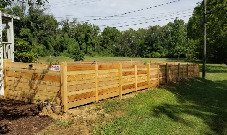 4-foot-high-Cedar-Horizontal-Fence-with-alternating-sized-boards-and-dog-ear-posts-scaled-1.jpg