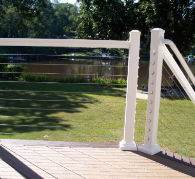 cable railing on the back of a house's deck