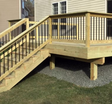 wood railing on the back of a house