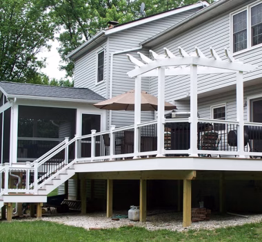 Composite deck with screened porch and trellis