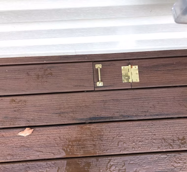 Access latch in deck board.