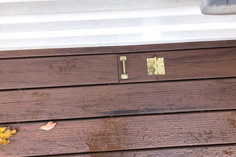 Access latch in deck board.