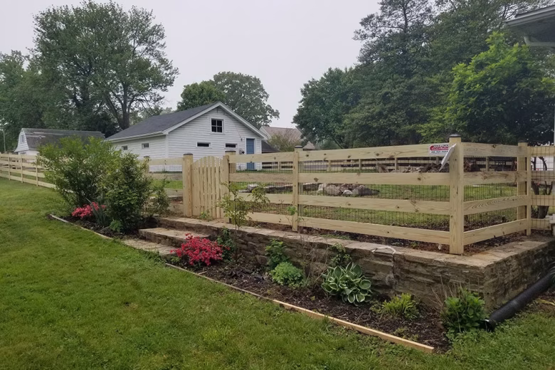 4-Board Ranch Rail Pressure Treated Fence with black vinyl coated mesh