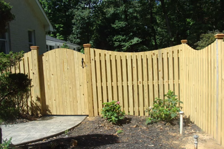 Concave Dip Board on Board Wood Privacy Fence with Arched Gate
