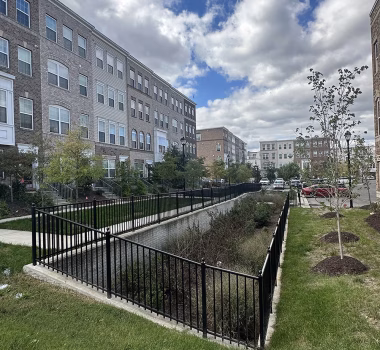 Aluminum Railing around Drainage Pond in Townhome Community