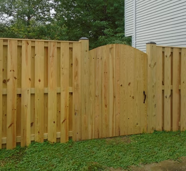 Pressure Treated Board on Board Privacy Fence with single arched gate