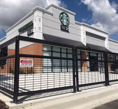 Commercial Steel Fencing in front of Starbucks seating area
