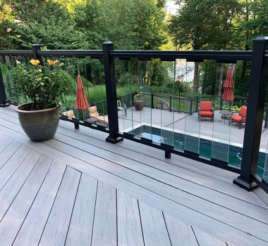 TimberTech Legacy Ashwood Composite Decking + Ultralox Aluminum Railing with Glass Picket Infills 2 Level Deck with Pool