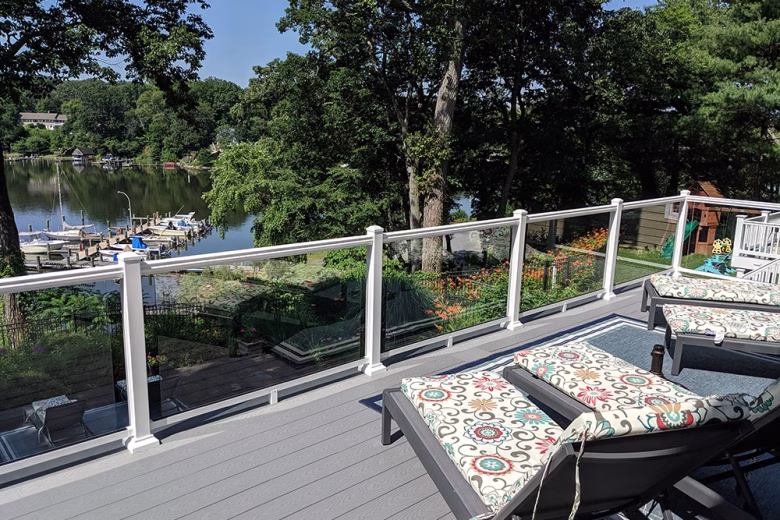 Trex Select Pebble Gray Decking with White Ultralox Aluminum Railing with Full Glass Panel Infills in Severna Park MD