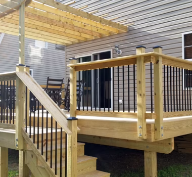 Wood Deck with Wood Railing with Black Aluminum Balusters and Wood Pergola