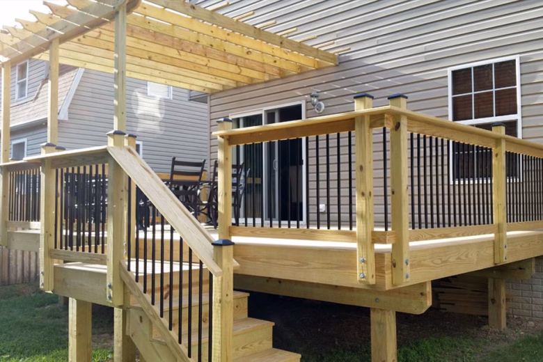 Wood Deck with Wood Railing with Black Aluminum Balusters and Wood Pergola