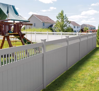 White Vinyl Privacy Fence With Closed Top Spindles