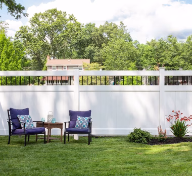 White Vinyl Privacy Fence with Round Aluminum Spindle Topper