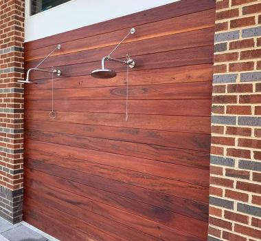 Wood Decking on the walls of the outdoor shower at Monarch at Waugh Chapel