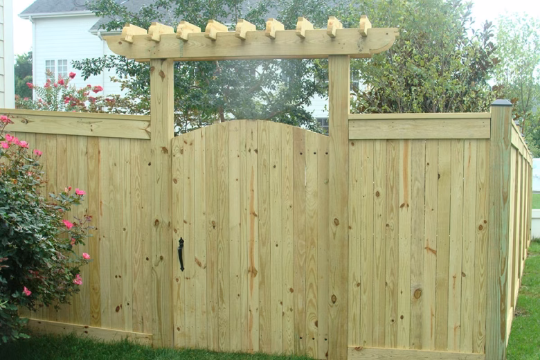 Wood Privacy Fence With Fascia Boards And Gate Trellis