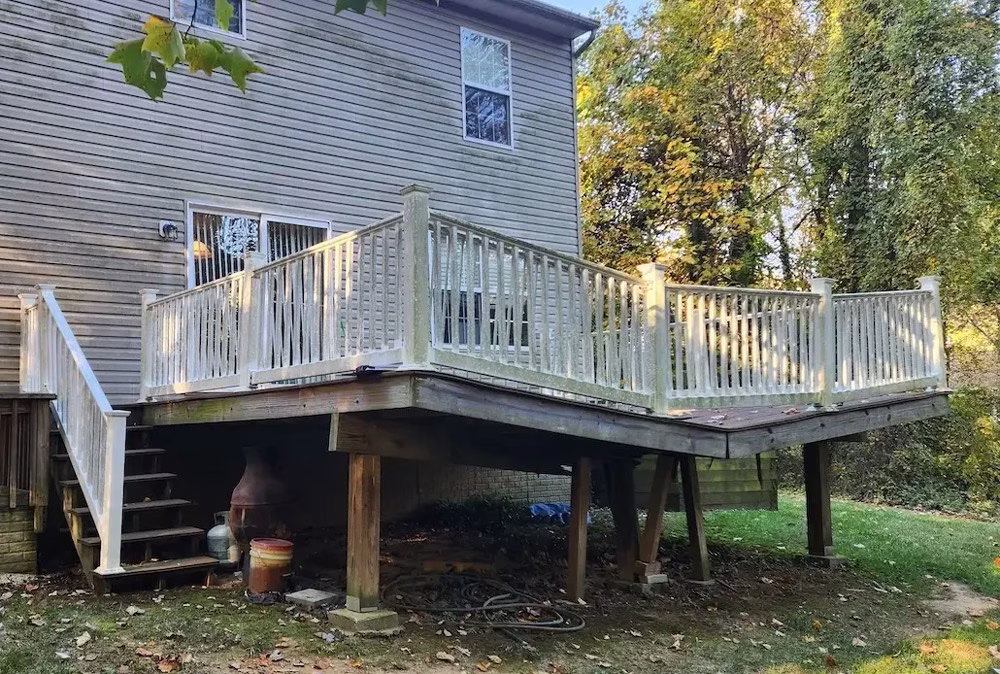 broken wooden deck collapsing in the middle