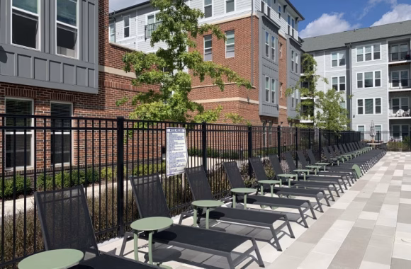 commercial fence out by a pool