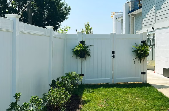 a commercial vinyl fence in a neighborhood