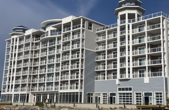 Commercial Hotel with White Aluminum Balcony Railing with Glass panels in OC MD
