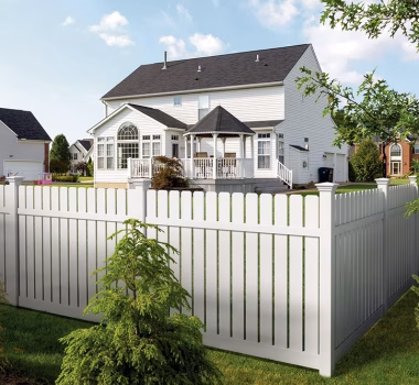 Dogear spaced picket white vinyl fence