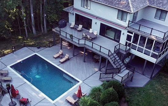 Multi-level Composite Decking with Aluminum Railing around pool