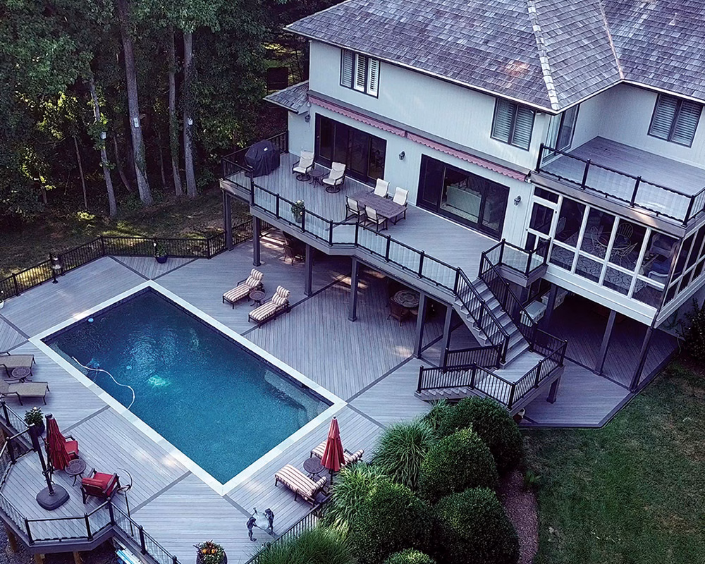 Multi-level Composite Decking with Aluminum Railing around pool