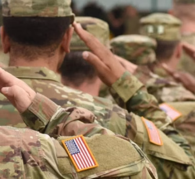 soldiers lined up and saluting