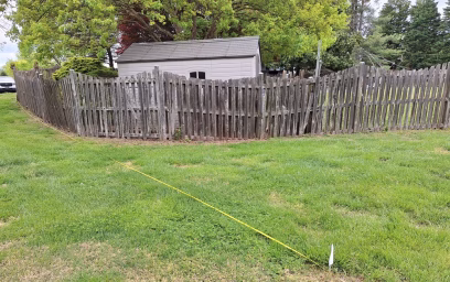 broken wooden fence that needs to be replaced