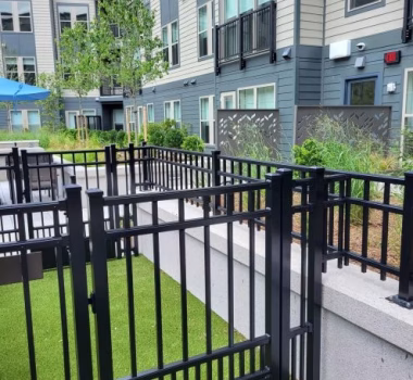 Puppy Picket Aluminum Dog Park Fencing in Courtyard of Multi-Family Complex